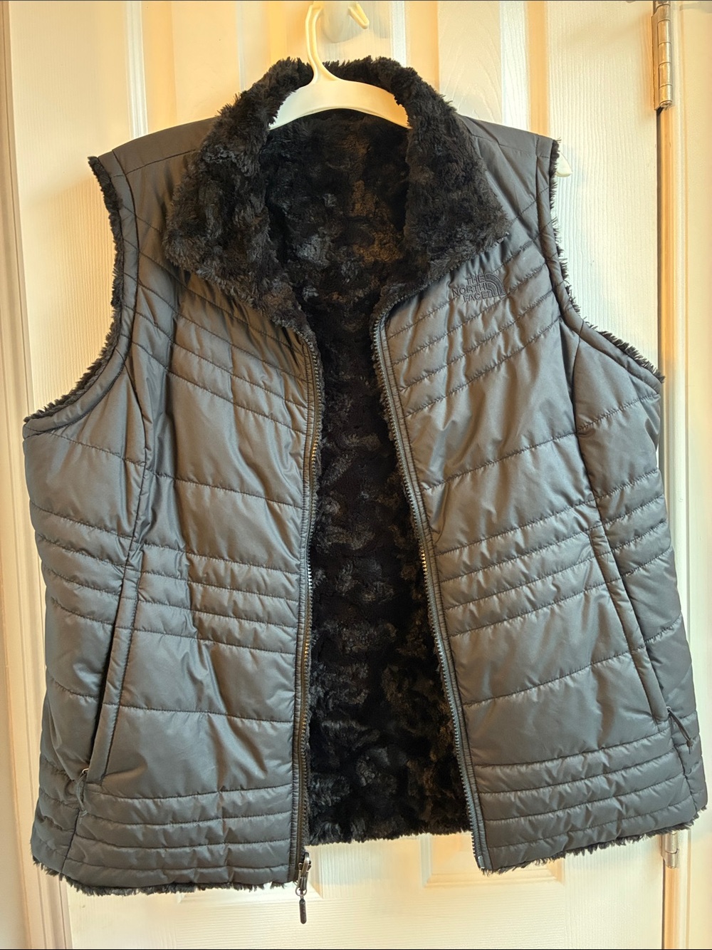 The North Face Women’s black Quilted Vest with Black Faux-Fur Lining